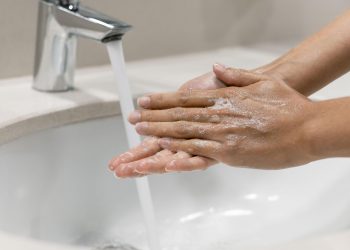 person-washing-hands-close-up